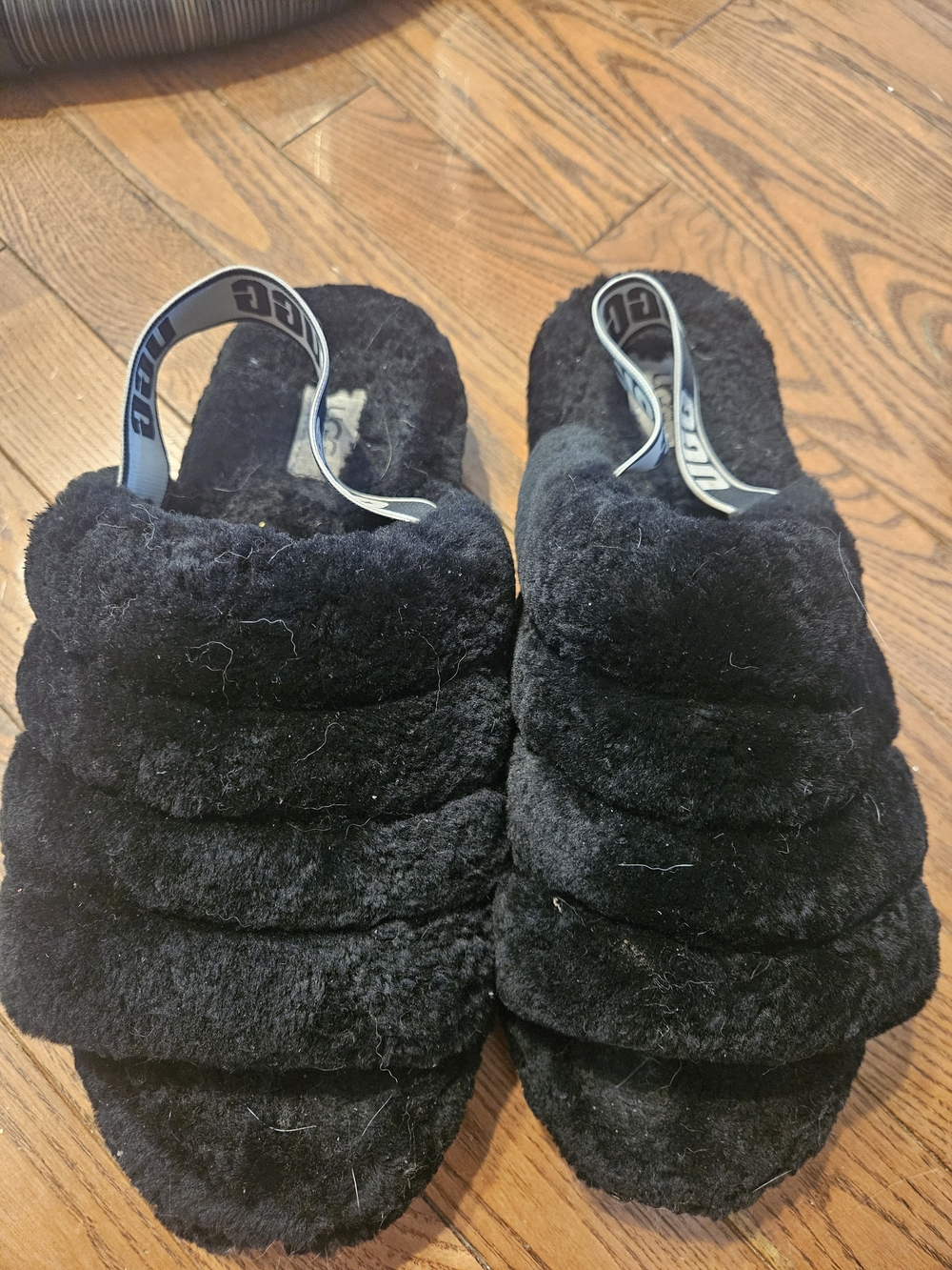UGG Black Fuzzy Slide Slippers with Logo Heel Strap